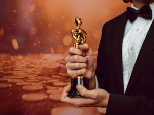attore che tiene oscar, sodo soldi
