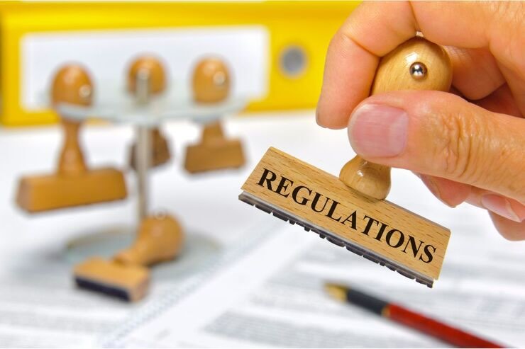 Timbro con scritto "regulations"