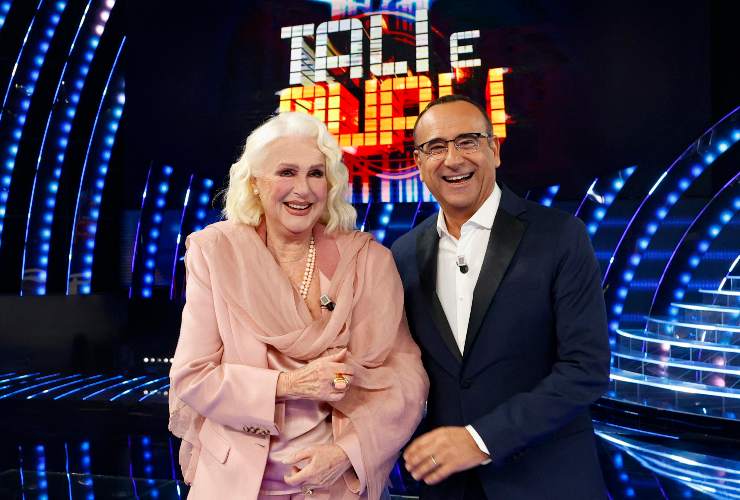 loretta goggi con carlo conti a tale e quale show